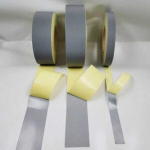 Reflective fabric with adhesive backing