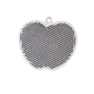 White apple-shaped acrylic hard reflector keychain for backpacks, bicycles, and outdoor safety, made with high-reflective microprism surface.