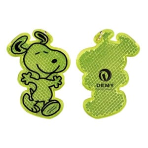 Yellow Snoopy-shaped hard reflector keychain made of durable acrylic, designed for child safety and outdoor visibility, EN17353 compliant.