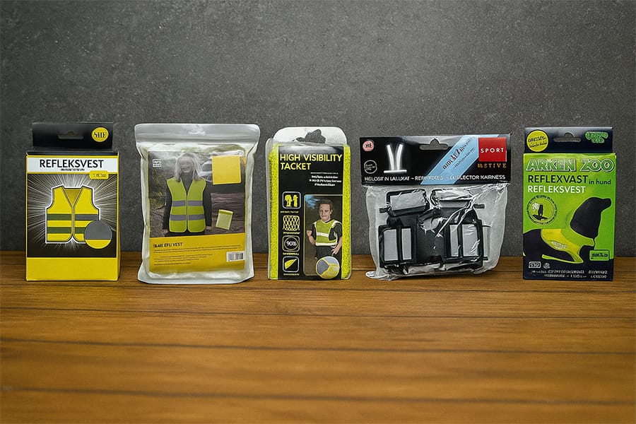 retail packaging for reflective vests showing color box, header bag, laminated bag, and PET box options